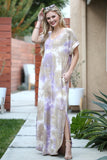 women wearing V-neck tie-die maxi dress with pocket and side split details